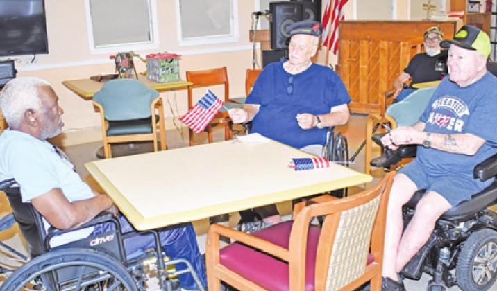 VETERANS AT CHI St. Joseph Health Manor Nursing Home attend the Memorial Day service there. They included Luke Johnson Jr., Jeff Carroll, Leon Schoebel and Johnny Ellis.