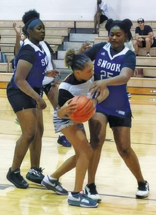 SNOOK JUNIOR High School and Snook High School girls took on Somerville last week at the Somerville High School Gym.